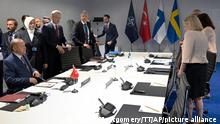 Turkish President Recep Tayyip Erdogan, NATO Secretary General Jens Stoltenberg and Swedish Prime Minister Magdalena Andersson at a meeting regarding Sweden's membership application for NATO prior to the NATO summit in Madrid, Spain, Tuesday, 28 June 2022. (Henrik Montgomery/TT News Agency via AP)