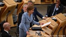 EDINBURGH, SCOTLAND - JUNE 28: Scotland's First Minister Nicola Sturgeon addresses MSPs at Holyrood on June 28, 2022 in Edinburgh, Scotland. Sturgeon has justified her call for a new independence referendum by citing changes to the state of the UK since the Indy Ref, coupled with a perceived mandate from the last Scottish elections. (Photo by Jeff J Mitchell/Getty Images)