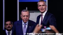 Turkish President Recep Tayyip Erdogan, second left, and NATO Secretary General Jens Stoltenberg before signing a memorandum in which Turkey agrees to Finland and Sweden's membership of the defense alliance in Madrid, Spain on Tuesday, June 28, 2022. North Atlantic Treaty Organization heads of state will meet for a summit in Madrid from Tuesday through Thursday. (AP Photo/Bernat Armangue)