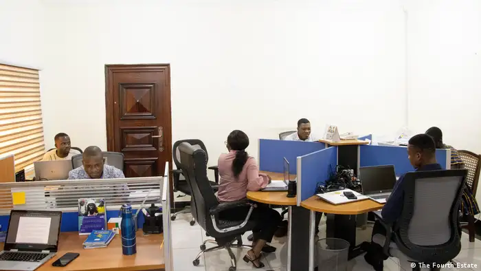 The Fourth Estate team at work in their office in Accra.