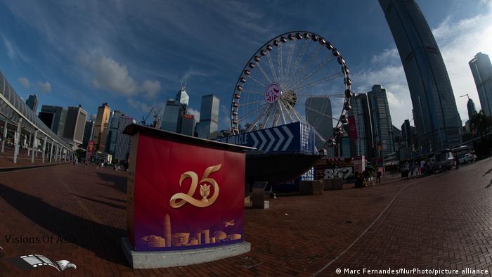 A poster celebrating the 25th anniversary of the return of Hong Kong to Chinese rule is seen in Central Hong Kong