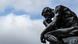 Die Plastik "Der Denker" ("Le Penseur") des Bildhauers Auguste Rodin ist vor einem wolkenverhangenen Himmel zu sehen. Die Plastik "Der Denker" ("Le Penseur") des Bildhauers Auguste Rodin ist vor einem wolkenverhangenen Himmel zu sehen.