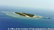 epa05421598 A handout photo provided by the Office of the President of Taiwan on 12 July 2016 shows an aerial photograph of Taiping Island, also known as Itu Aba Island in the South China Sea, 23 March 2016. The international tribunal in The Hague issued its ruling on 12 July 2016 that China has no legal basis for its _nine-dash line_ claiming most part of the South China Sea. EPA/OFFICE OF THE PRESIDENT TAIWAN / HANDOUT HANDOUT EDITORIAL USE ONLY/NO SALES HANDOUT EDITORIAL USE ONLY/NO SALES ++
