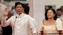 Ferdinand Marcos Jr. and his wife Louise at the presidential swearing in ceremony in Manila