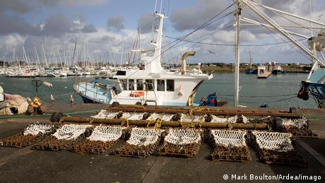 Scallop dredging nets on a fishing trawler in Normandy, France