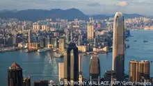 TOPSHOT - This photo taken on September 8, 2017 shows The Centre skyscraper (centre L), located in the city's bustling Central district of Hong Kong.
A landmark skyscraper owned by Hong Kong's richest man Li Ka-shing has sold for a record of more than 5 billion USD, according to a report on October 16, indicating that the city's booming property sector shows no sign of slowing down. / AFP PHOTO / ANTHONY WALLACE (Photo credit should read ANTHONY WALLACE/AFP via Getty Images)