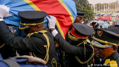 The cortege carrying slain Congolese independence hero Patrice Lumumba's only surviving remains arrives at Palais du Peuple in Kinshasa