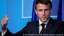 French President Emmanuel Macron speaks during a press conference after a NATO summit Thursday, June 30, 2022 in Madrid. (AP Photo/Christophe Ena)