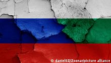 flags of Russia and Bulgaria painted on cracked wall