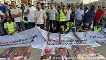 TRIPOLI, LIBYA - JULY 01: Young people stage a protest demanding the dissolution of the legislative and executive institutions in the country at Martyr's Square in Tripoli, Libya on July 01, 2022. Hazem Turkia / Anadolu Agency