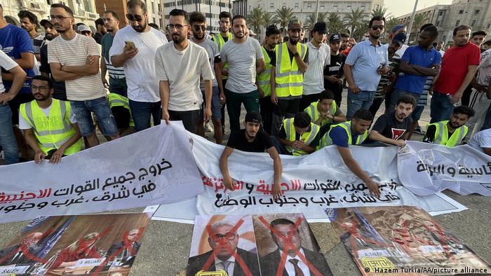 Young people stage a protest demanding the dissolution of the legislative and executive institutions in the country at Martyr's Square in Tripoli, Libya on July 01, 2022.