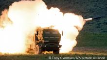 FILE - In this May 23, 2011, file photo a launch truck fires the High Mobility Artillery Rocket System (HIMARS) produced by Lockheed Martin during combat training in the high desert of the Yakima Training Center, Wash. U.S. officials will send another $450 million in military aid to Ukraine, including some additional medium-range rocket systems. The latest package will include a number of High Mobility Artillery Rocket Systems, or HIMARS. (Tony Overman/The Olympian via AP, File)