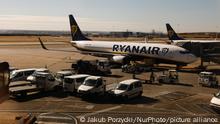 Airport vehicles and Ryanair airplanes are seen at the Barajas airport in Madrid, Spain on June 27, 2022. (Photo by Jakub Porzycki/NurPhoto)