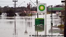 A fuel station in Sydney inundated by flooding caused by torrential rain
