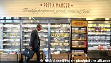 Pret A Manger to open 200 stores. File photo dated 18/09/17 of a man shopping in a Pret A Manger store in Melcombe Street in central London. Pret a Manger has said it will open more than 200 UK shops over the next two years, after securing a further £100 million cash injection. The sandwich and coffee chain was battered by the pandemic but said it has seen its city centre sites recover further in recent weeks as more workers have returned to the office. Issue date: Tuesday September 21, 2021. See PA story CITY Pret . Photo credit should read: Nick Ansell/PA Wire URN:62564831