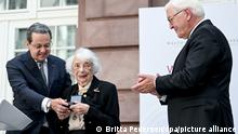 Margot Friedländer stands next to German President Frank-Walter Steinmeier while receiving the Walther Rathenau Prize