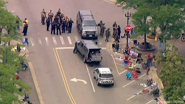 Police deploy after gunfire erupted at a Fourth of July parade route in the wealthy Chicago suburb of Highland Park