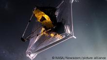 An artist's illustration of the James Webb Space Telescope (JWST) in space. As of December 15, 2021, the JWST team was working on a communication issue between the observatory and the launch vehicle system, delaying the launch date to no earlier than Friday, December 24. NASA Photo/UPI Photo via Newscom picture alliance