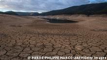 TOPSHOT - A picture shows low water levels at a reservoir in drought-stricken Entrepenas near Sacedon on November 24, 2017. - Spain and Portugal are grappling with a devastating drought which has left rivers nearly dry, sparked deadly wildfires and devastated crops -- and experts warn that prolonged dry spells will become more frequent. (Photo by PIERRE-PHILIPPE MARCOU / AFP) (Photo by PIERRE-PHILIPPE MARCOU/AFP via Getty Images)