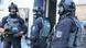 Close up photo of three armed German police officers in Osnabrück wearing helmets, balaclavas, and body armor, taken on July 5, 2022, during the operation Close up photo of three armed German police officers in Osnabrück wearing helmets, balaclavas, and body armor, taken on July 5, 2022, during the operation