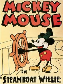 A picture of the first version of Mickey Mouse steering a boat in the 1928 animation film 'Steamboat Willie'.