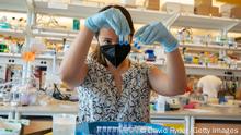 SEATTLE, WA - MAY 10: Erin Yang holds tubes of proteins while working on vaccine and protein research in the King Lab at the University of Washington on May 10, 2022 in Seattle, Washington. A new COVID-19 vaccine, GPB510, has been developed at the University of Washington School of Medicine by the King Lab and the Veesler Lab. (Photo by David Ryder/Getty Images)