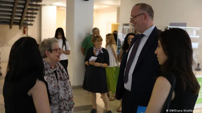 DW Akademie's Managing Director Carsten von Nahmen and EU Ambassador Andrea Wiktorin chat at the opening of the E-School in Yerevan on July 1, 2022