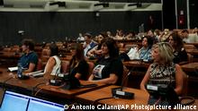 Relatives of the Morandi bridge collapse victims follow the start of the trial at the Genoa's Palace of Justice,