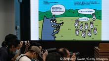 HONG KONG, CHINA - JULY 22: Content of children's books are displayed on a TV screen during a press conference after five people were arrested under suspicion of conspiring to publish seditious material at the Hong Kong Police Headquarters on July 22, 2021 in Hong Kong, China. National Security Department of Hong Kong Police Force arrested five members of the General Union of Hong Kong Speech Therapists over three children's books featuring sheep that are suspected of inciting hatred towards the Hong Kong SAR government. (Photo by Anthony Kwan/Getty Images)