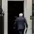 Boris Johnson walking into 10 Downing Street