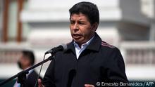 (FILES) In this file photo taken on April 05, 2022 Peru's President Pedro Castillo addresses the media as he arrives to the National Congress in Lima. - Castillo will be questioned by a congressional committee on June 27 for the first time in a case of alleged corruption that could trigger a call for his impeachment, his lawyer said on June 26, 2022. (Photo by Ernesto BENAVIDES / AFP)