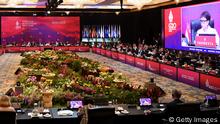 NUSA DUA, INDONESIA - JULY 08: The Indonesian Minister for Foreign Affairs, Retno Marsudi (C) opens the G20 Foreign Ministers and Head of Department meeting at the Grand Ballroom Mulia Hotel on July 08, 2022 in Nusa Dua, Indonesia. (Photo by Pool/Getty Images)