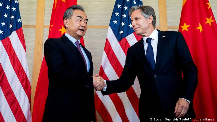 U.S. Secretary of State Antony Blinken, right, shakes hands with China's Foreign Minister Wang Yi during a meeting in Nusa Dua on the Indonesian resort island of Bali Saturday, July 9, 2022. 
