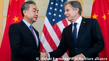 U.S. Secretary of State Antony Blinken, right, shakes hands with China's Foreign Minister Wang Yi during a meeting in Nusa Dua on the Indonesian resort island of Bali Saturday, July 9, 2022. (Stefani Reynolds/Pool Photo via AP)