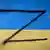 LYSYCHANSK, LUGANSK REGION, UKRAINE - JULY 8, 2022: A Z-sign is painted on a surface in the colors of the Ukrainian flag