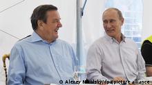 epa02901816 Russian Prime Minister Vladimir Putin (R) and Former German Chancellor and Chairman of the Nord Stream shareholders' committee Gerhard Schroeder (L) laugh during their meeting with staff members of the Portovaya compressor station's dispatch center outside Vyborg, a city 130 km northwest of St. Petersburg, Russia 06 September 2011. Gazprom on 06 September started pumping gas into the first line of the Nord Stream gas pipeline which links the Russian and German coasts via the Baltic sea bed. Nord Stream consists of two 1,224 km natural gas pipelines. When fully operational in the last quarter of 2012, the twin pipeline system will supply 55 billion cubic metres (bcm) of Russian gas a year to the EU. EPA/ALEXEY NIKOLSKY MANDATORY CREDIT / RIA NOVOSTI /*** NO SALES NO ARCHIVES NOT FOR USE AFTER 06 OCTOBER 2011*** NO SALES/NO ARCHIVES ++ +++ dpa-Bildfunk +++