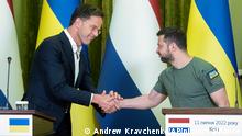 President of Ukraine Volodymyr Zelenskyy, right, shakes hands with Prime Minister of the Netherlands Mark Rutte during their joint press conference following their meeting in Kyiv, Ukraine, Monday, July 11, 2022. (AP Photo/Andrew Kravchenko)