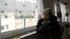 Ahrtal resident Julia Heinrichs stares melancholically out the window Ahrtal resident Julia Heinrichs stares melancholically out the window