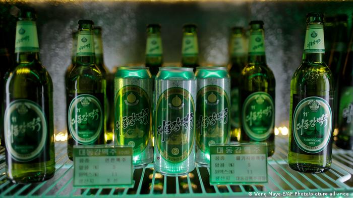 Different types of Taedonggang beer are displayed in a refrigerator at the Taedonggang Brewery in Pyongyang