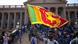 A protester waves a national flag outside president Gotabaya Rajapaksa's office in Colombo, Sri Lanka A protester waves a national flag outside president Gotabaya Rajapaksa's office in Colombo, Sri Lanka