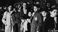 Picture taken in 1942 shows Jewish deportees in the Drancy transit camp, their last stop before the German concentration camps. - Some 13,152 Jews were rounded up 16-17 July 1942, by French police forces, in Paris from their homes and taken in buses to the Vel d'Hiv, or winter cycling stadium in southwestern Paris. Then were later taken to a rail terminal at Drancy, northeast of the French capital, and then deported to the east. Only a handful returned. Those in Europe who escaped the Nazi holocaust were herded into refugee camps and some, with organized Zionist help, tried to reach Palestine. (Photo by AFP)