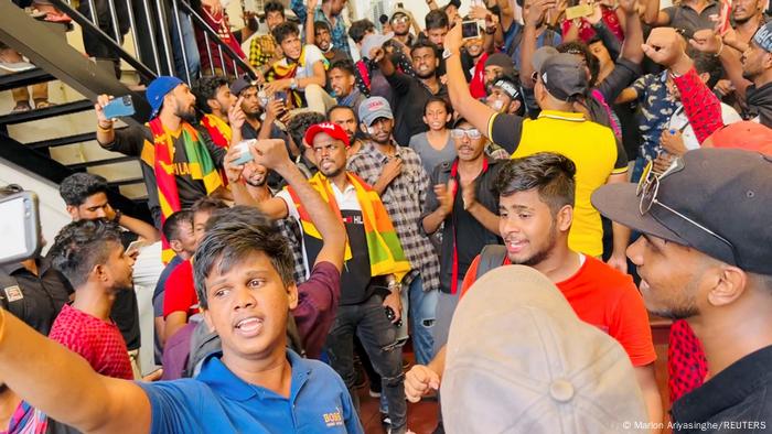 People protest inside Prime Minister Ranil Wickremesinghe's office.