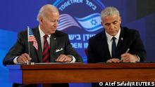 14.07.2022
U.S. President Joe Biden and Israeli Prime Minister Yair Lapid sign a security pledge at Waldorf Astoria Hotel in Jerusalem, Israel July 14, 2022. Atef Safadi/Pool via REUTERS