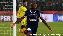 Chennaiyin FC's forward Dudu Omagbemi celebrates after scoring a goal against NorthEast United FC during the Indian Super League (ISL) football match between Chennaiyin FC and NorthEast United FC a at The Jawaharlal Nehru Athletic Stadium in Chennai on November 26, 2016. RESTRICTED TO EDITORIAL USE - STRICTLY NO COMMERCIAL USE / AFP / ARUN SANKAR / RESTRICTED TO EDITORIAL USE - STRICTLY NO COMMERCIAL USE (Photo credit should read ARUN SANKAR/AFP via Getty Images)
