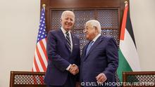 U.S. President Joe Biden shakes hands with Palestinian President Mahmoud Abbas at the Presidential Compound, in Bethlehem, in the Israeli-occupied West Bank July 15, 2022. REUTERS/Evelyn Hockstein