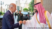 Saudi Crown Prince Mohammed bin Salman fist bumps U.S. President Joe Biden upon his arrival at Al Salman Palace, in Jeddah, Saudi Arabia, July 15, 2022. Bandar Algaloud/Courtesy of Saudi Royal Court/Handout via REUTERS ATTENTION EDITORS - THIS PICTURE WAS PROVIDED BY A THIRD PARTY