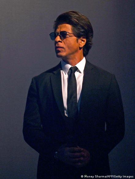 At The Jawan Press Conference, Shah Rukh Khan In A Buckled Suit And Braids  Has Never Looked More Jawan Than AT 57