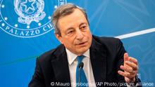 Italian Premier Mario Draghi meets the media in Rome, Tuesday, July 12, 2022. Premier Mario Draghi insisted Tuesday his government was able to continue working despite tensions with the 5-Star Movement, but he warned that it can’t function if coalition members make ultimatums. Draghi briefed reporters after meeting with unions on the government’s latest efforts to mitigate the effects of soaring inflation and high energy costs on workers, families and industries. (Mauro Scrobogna/LaPresse via AP)