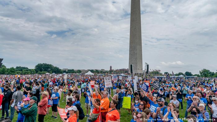 People participate in the second March for Our Lives rally in support of gun control in front of the Washington Monument