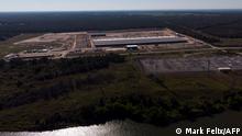 09.10.2021
An aerial view of the Whinstone US Bitcoin mining facility in Rockdale, Texas, on October 9, 2021. - The long sheds at North America's largest bitcoin mine look endless in the Texas sun, packed with the type of machines that have helped the US to become the new global hub for the digital currency. The operation in the quiet town of Rockdale was part of an already bustling US business -- now boosted by Beijing's intensified crypto crackdown that has pushed the industry west. Experts say rule of law and cheap electricity in the US are a draw for bitcoin miners, whose energy-gulping computers race to unlock units of the currency. There's a lot of competitors coming into Texas because they are seeing the same thing (as) when we came here, said Chad Everett Harris, CEO of miner Whinstone, which operates the Rockdale site owned by US company Riot Blockchain. (Photo by Mark Felix / AFP)